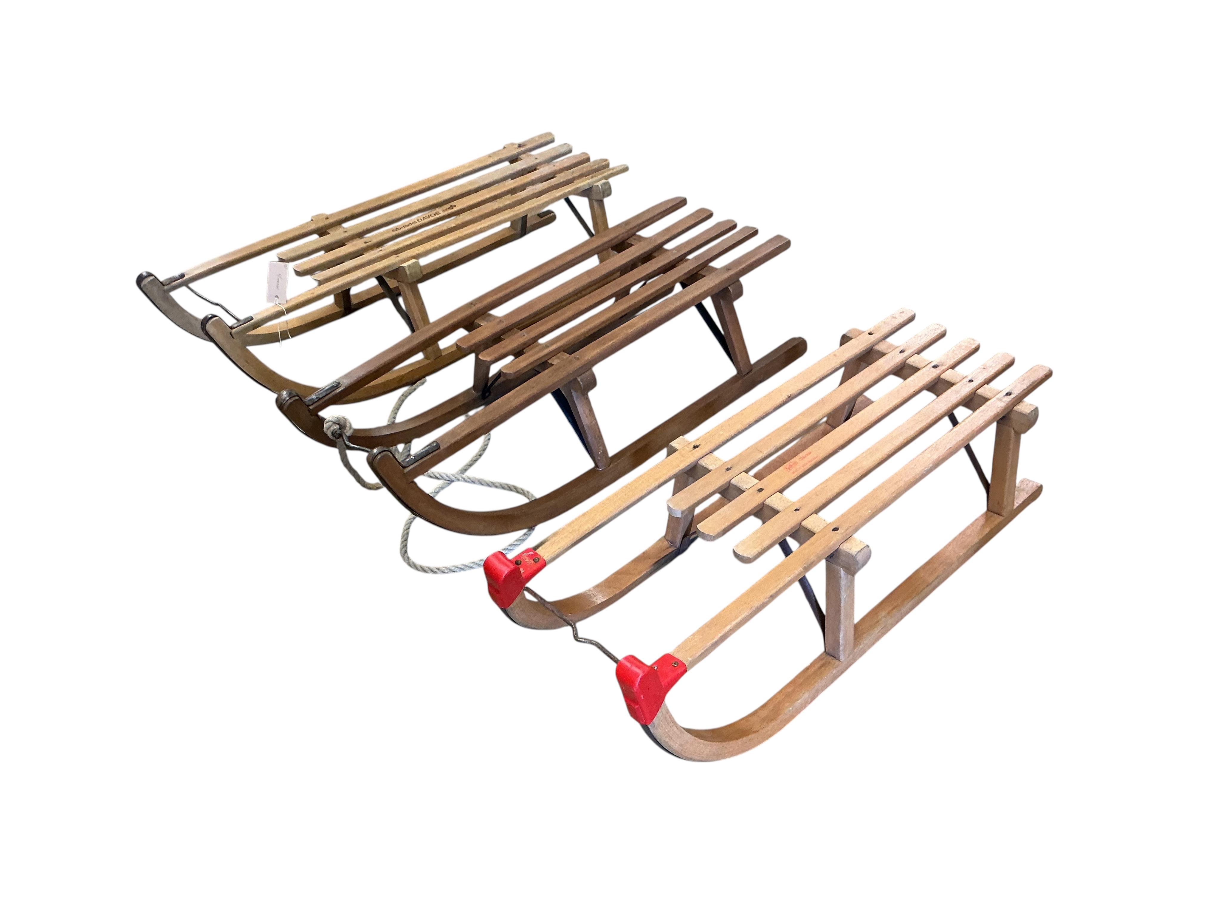 Three vintage Davos sledges